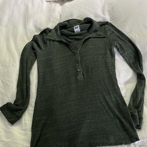 NSF long sleeve fitted cotton blend knit polo top.